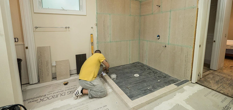 One of our experienced team members starting a bathroom  remodeling project in Lakeland.