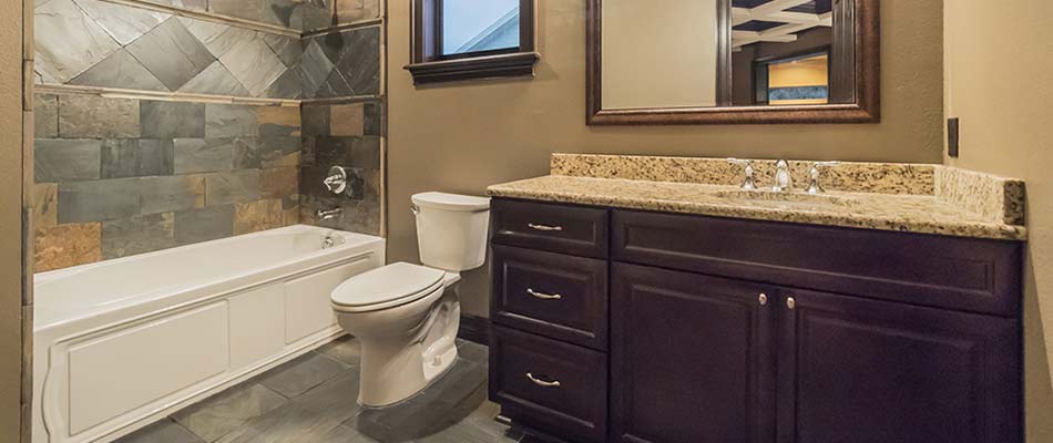 A newly-remodeled bathroom in Winter Haven, FL with ample storage.