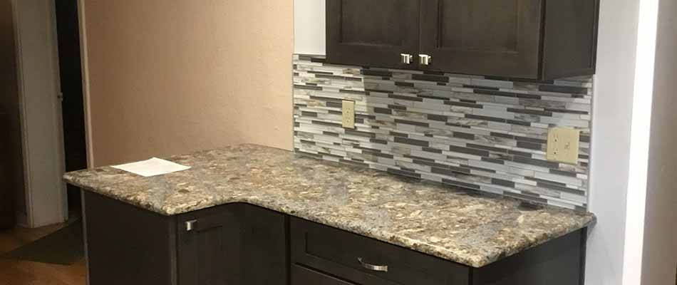 Custom kitchen countertops with backsplash installed in Lakeland, FL.