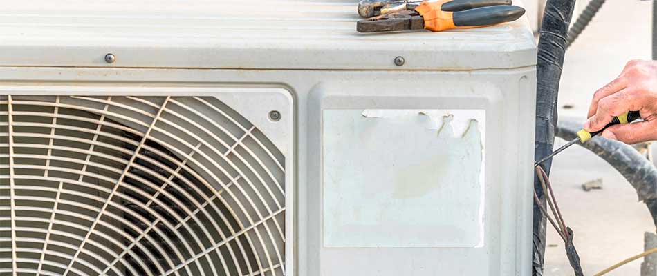 Repairs on a broken air conditioning unit in Plant City, FL.