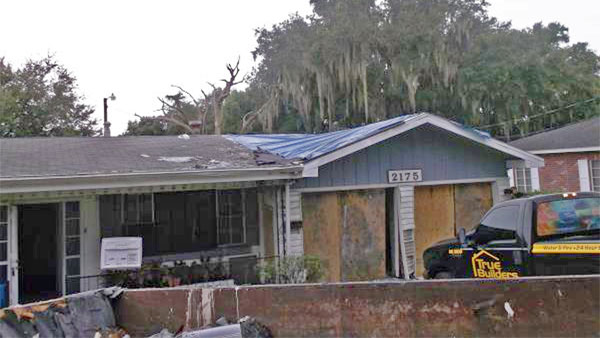 Home in Plant City, FL with fire damage.