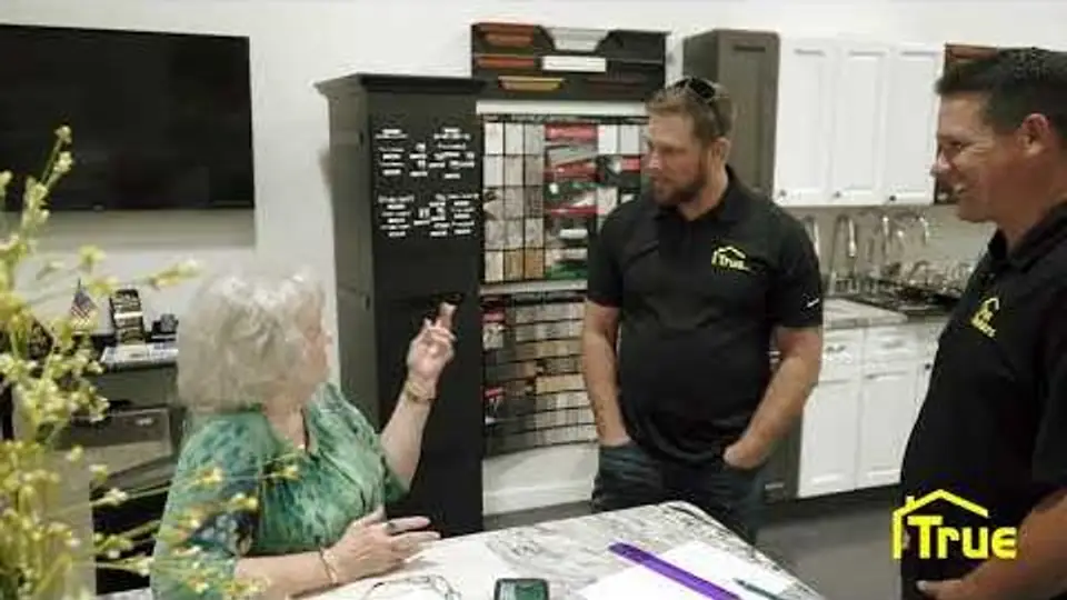 Choosing bathroom remodeling finishes at the True Builders showroom in Plant City with a designer and project manager